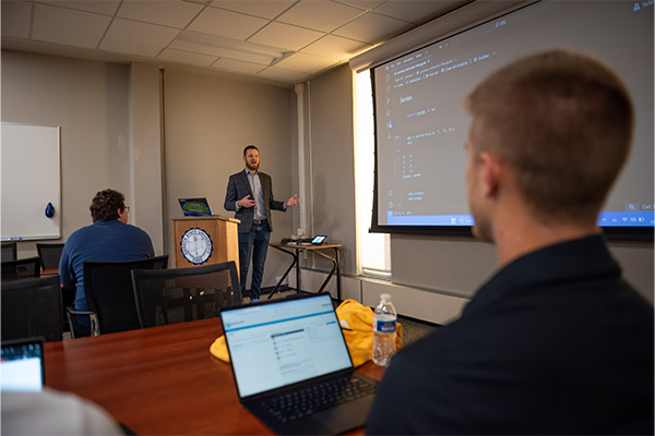 Dr. Andy Behrens teaching a class at Dakota State.